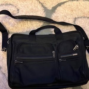 Tumi multi pocket bag